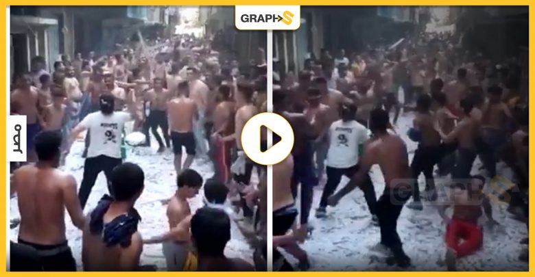بالفيديو|| في مصر.. شبان يرقصون على لمبات مكسرة شبه عراة في حي شعبي ليثير ضجة كبيرة فما السبب؟